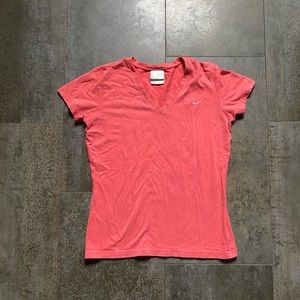 Nike women’s vintage coral athletic v-neck t-shirt. Size medium.